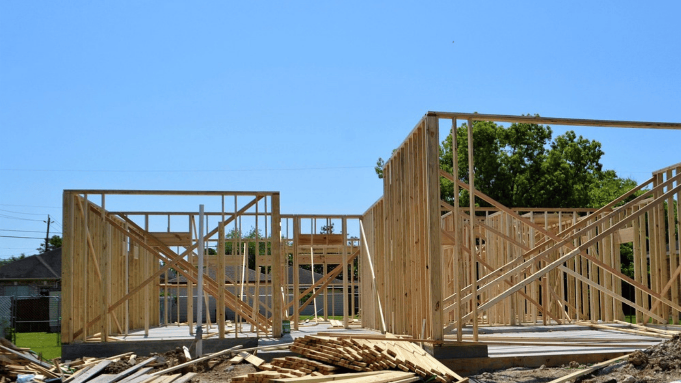 Timber framing on a residential construction site showing clean tradie job management and organised workflow.